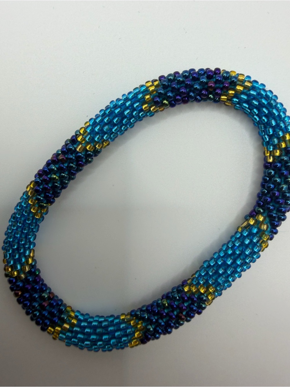 Turquoise Beaded Stretch Bracelet with Gold & Purple Accents